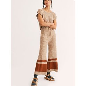 Free people- open back jumpsuit- size M